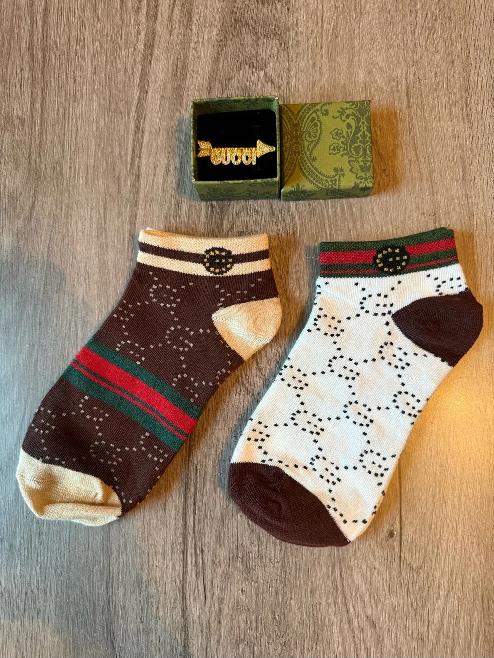 Gold Brooch and GG Designed Socks
